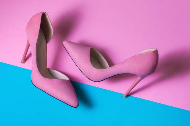 Pink Suede High Heels on pink background